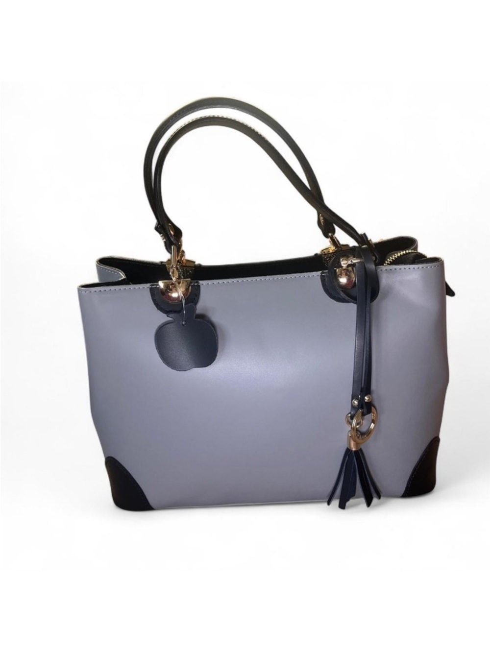 Black and grey purse with tassel